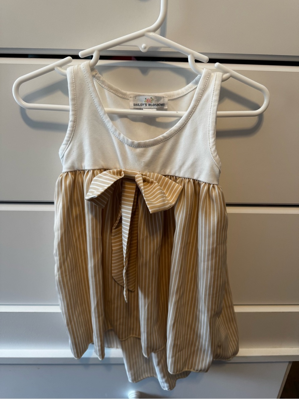 Bailey's Blossoms Cream & Tan Striped Bow Tank Top